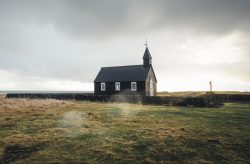 church surrounded by grass